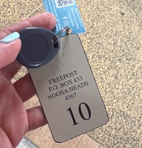 Lost Apartment entry fob with card attached Noosa